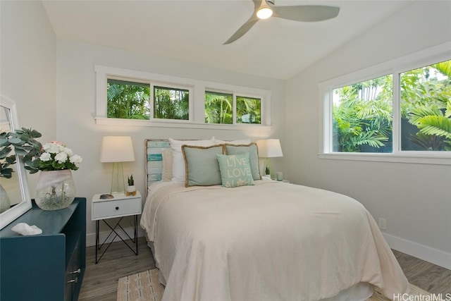 bedroom featuring dark wood-type flooring and ceiling fan