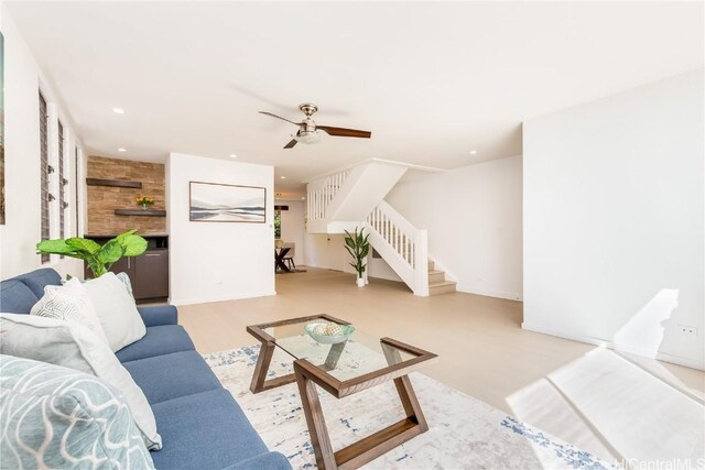 living room with ceiling fan