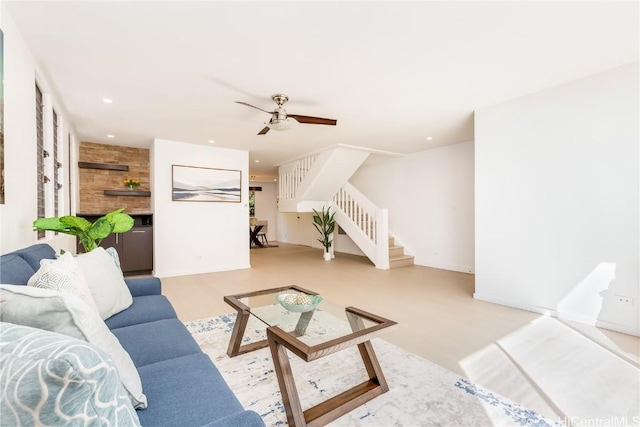 living room featuring ceiling fan