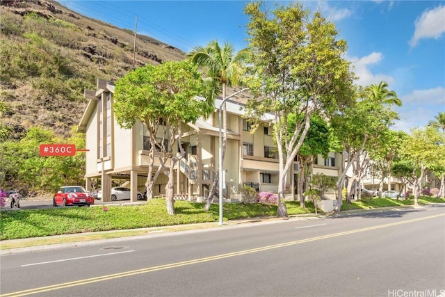 view of building exterior with a mountain view