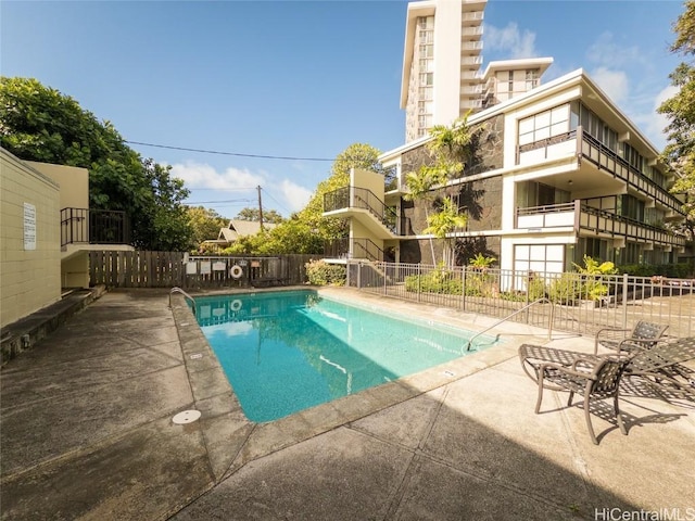 view of pool with a patio area