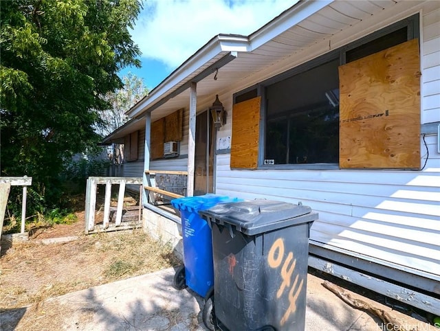 view of home's exterior with covered porch