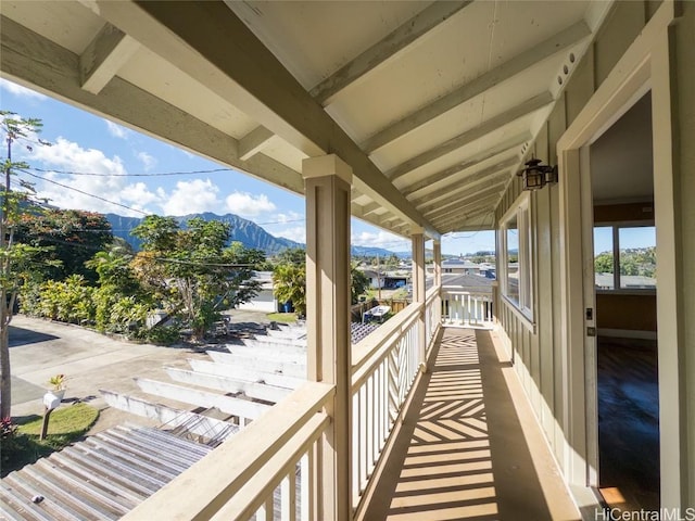 balcony featuring a mountain view