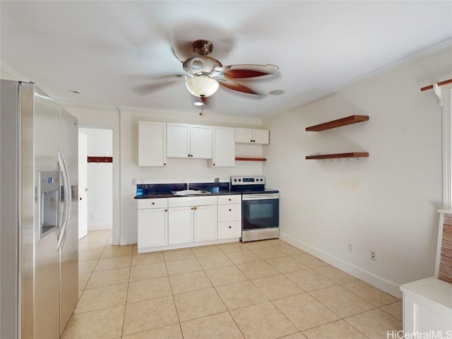 kitchen featuring ceiling fan, white cabinetry, stainless steel appliances, and light tile patterned floors