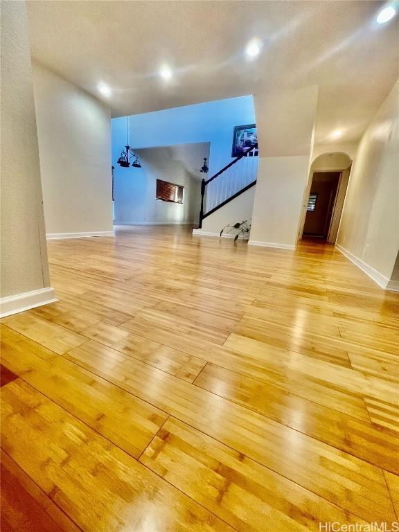 unfurnished living room featuring light hardwood / wood-style floors