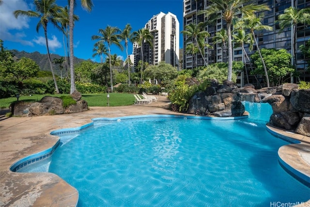 view of swimming pool with a patio area