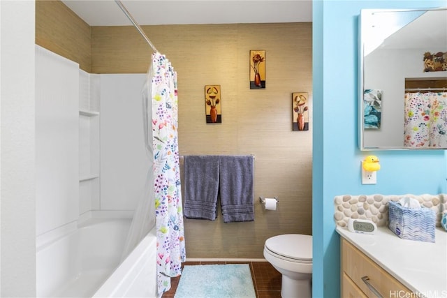 full bathroom featuring tile patterned floors, vanity, shower / bath combination with curtain, and toilet