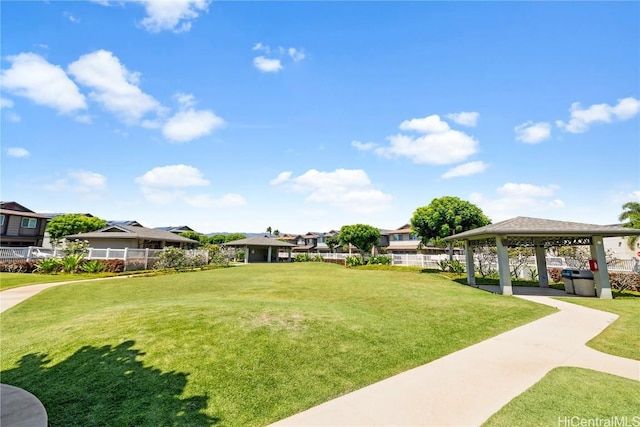 view of community with a gazebo and a yard