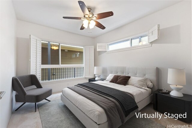 carpeted bedroom featuring ceiling fan