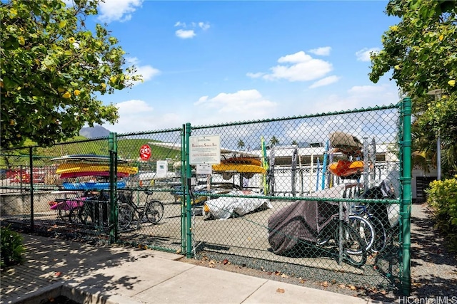 view of gate with fence