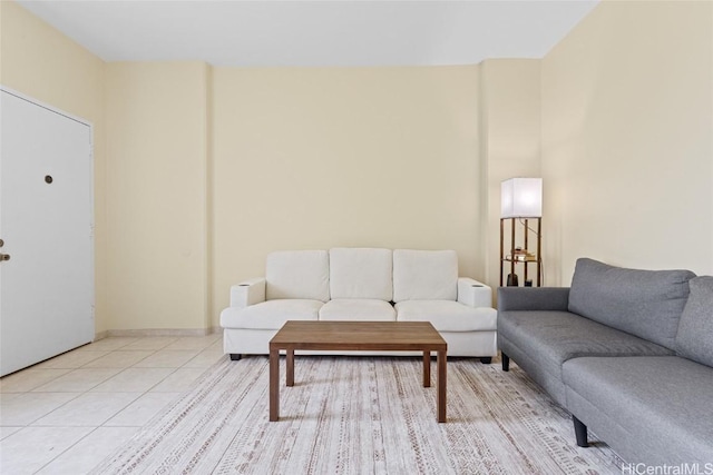 living room with light tile patterned floors