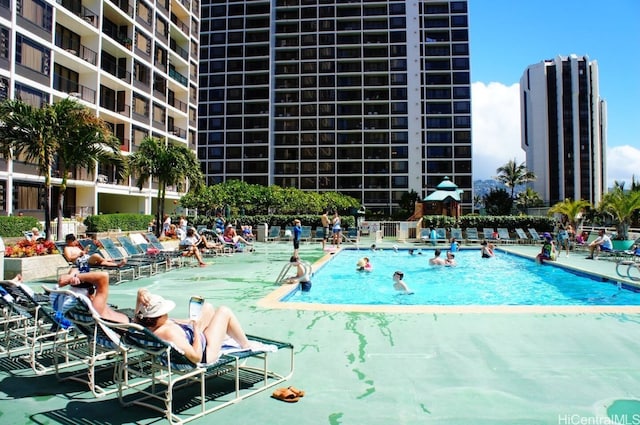 view of swimming pool with a patio