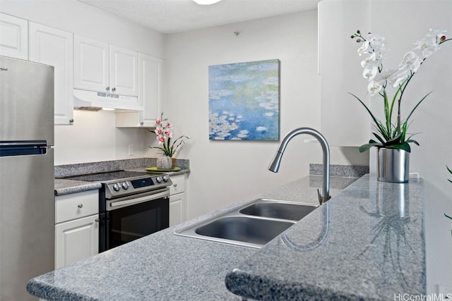 kitchen featuring sink, white cabinets, and stainless steel appliances