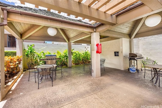 view of patio featuring a gazebo and a grill