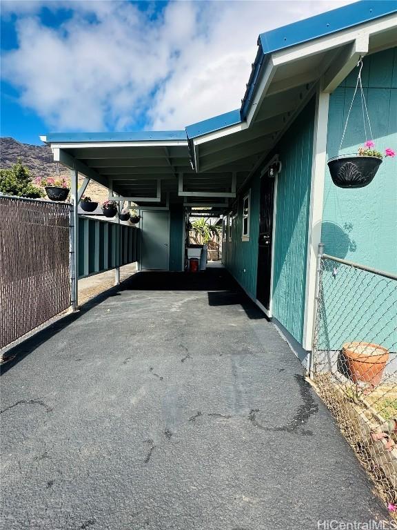 view of car parking featuring a carport