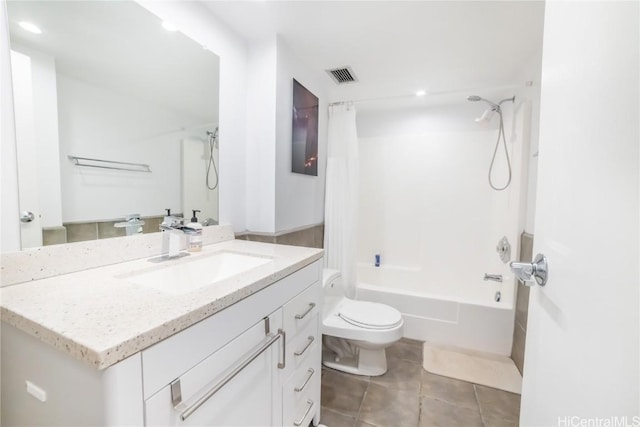 full bathroom with tile patterned floors, vanity, toilet, and shower / tub combo