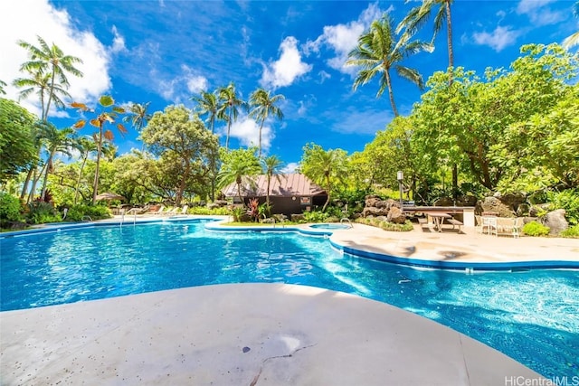 view of pool featuring a patio area