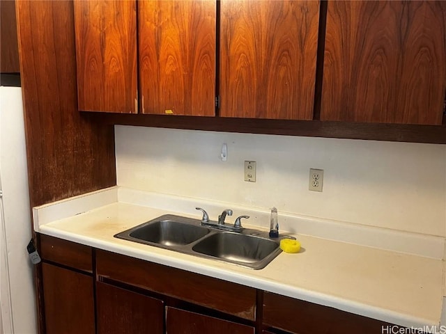 kitchen with white refrigerator and sink