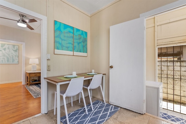 office space featuring ceiling fan and light tile patterned flooring