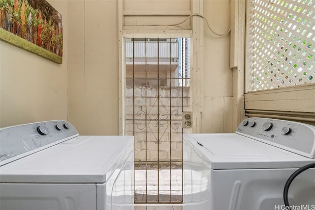 laundry room with independent washer and dryer