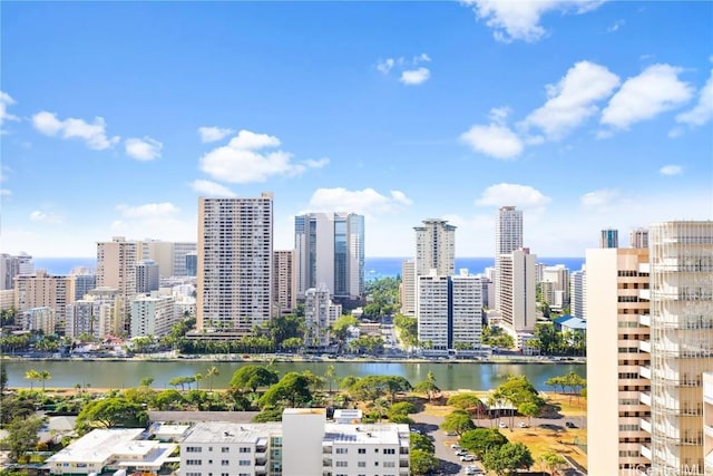 property's view of city with a water view