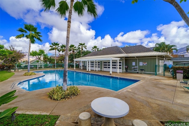 view of swimming pool featuring a patio