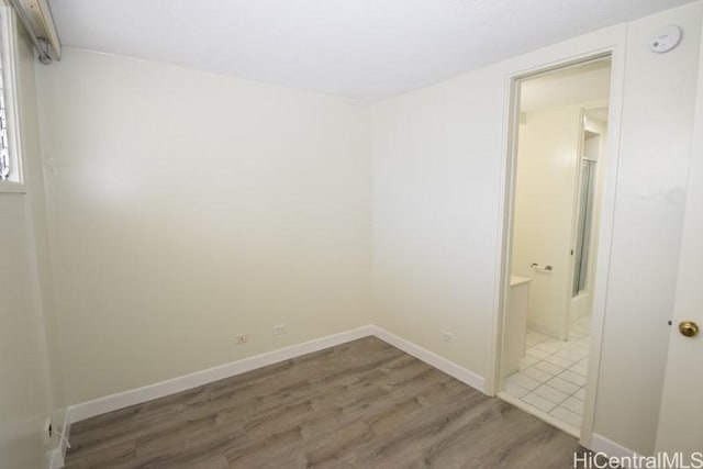 empty room featuring dark hardwood / wood-style floors