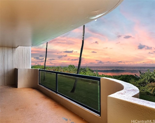 view of balcony at dusk