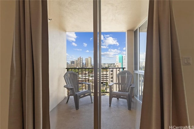 balcony featuring a view of city