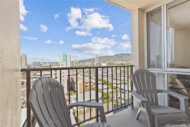 balcony featuring a view of city