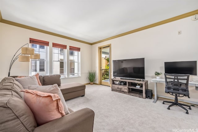 living room featuring light carpet, ornamental molding, and a healthy amount of sunlight