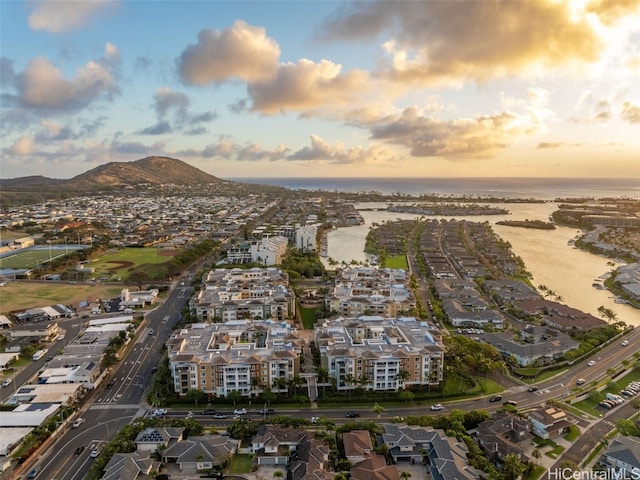 aerial view at dusk with a water and mountain view