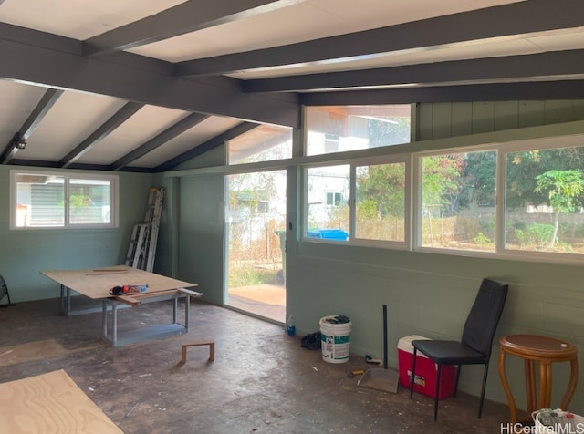 game room with lofted ceiling with beams