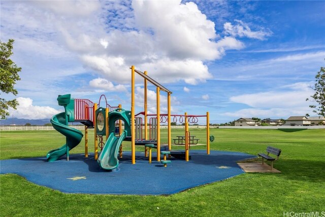 view of jungle gym with a yard