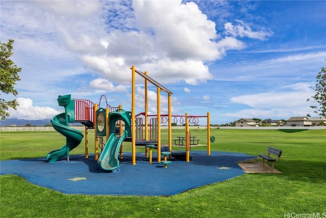 community playground featuring a lawn