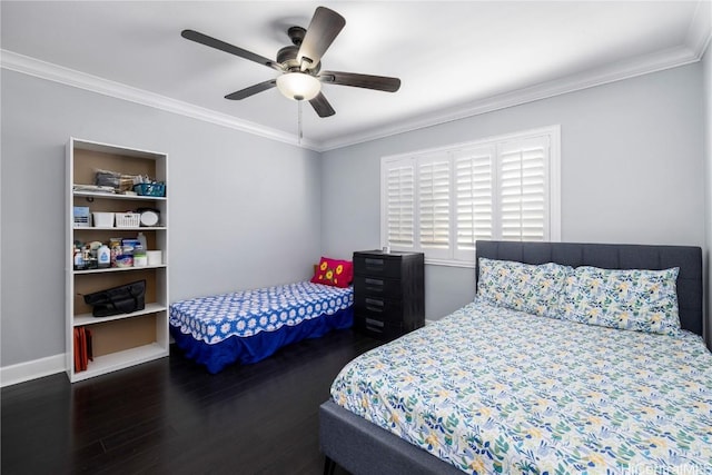 bedroom featuring ornamental molding, ceiling fan, and dark hardwood / wood-style flooring