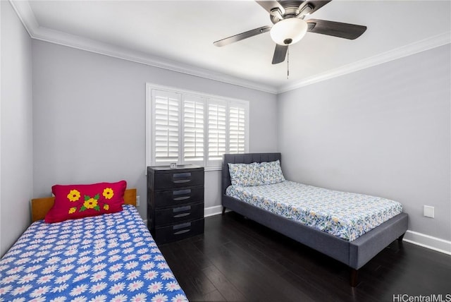 bedroom featuring ornamental molding, dark hardwood / wood-style floors, and ceiling fan