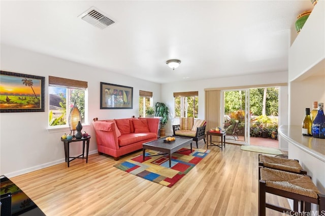 living room featuring light wood-type flooring