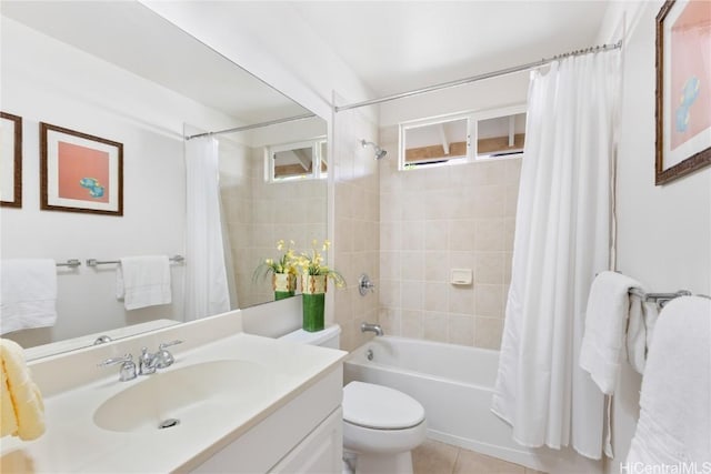 full bathroom with tile patterned floors, vanity, shower / tub combo, and toilet