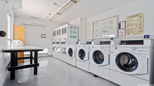 washroom featuring stacked washing maching and dryer and independent washer and dryer