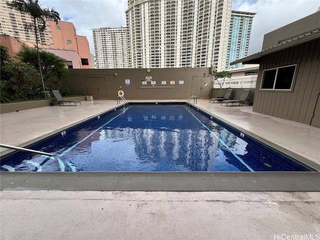 view of pool with a patio area