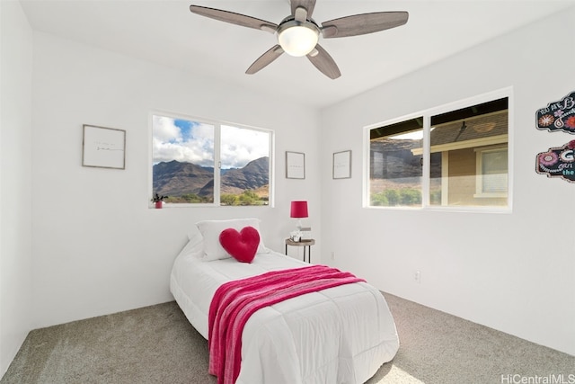 bedroom featuring carpet floors and ceiling fan