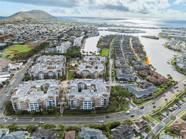 bird's eye view with a water and mountain view