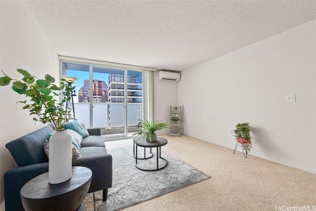 carpeted living room featuring a wall mounted air conditioner, floor to ceiling windows, and a textured ceiling