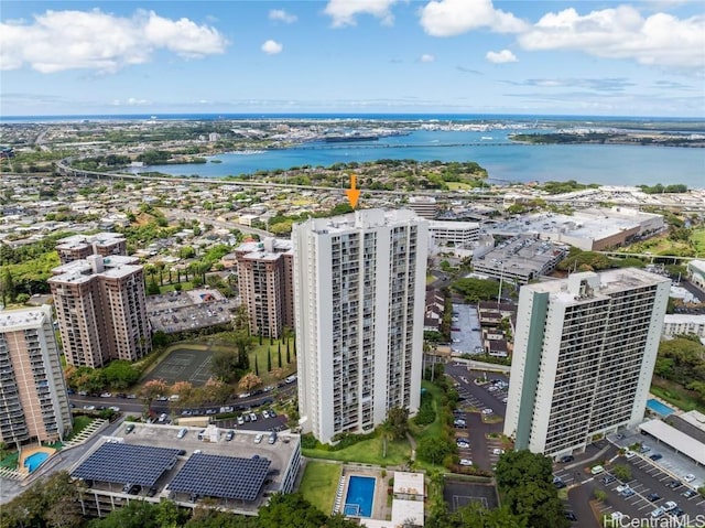 birds eye view of property with a water view