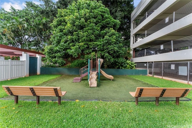 view of jungle gym with a yard