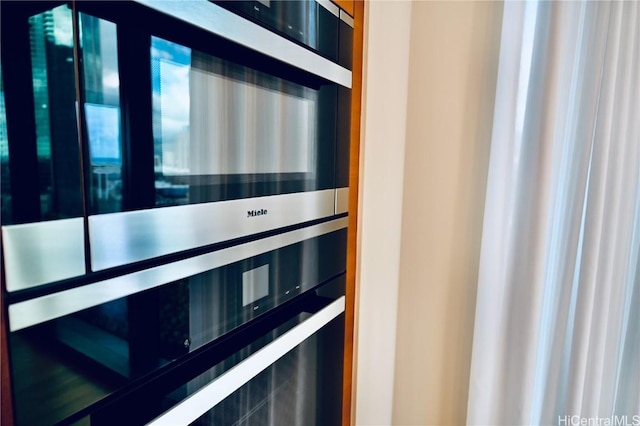 interior details featuring stainless steel double oven