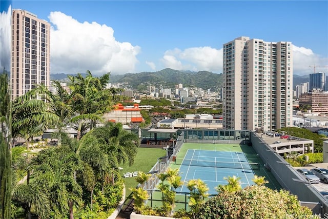 view of sport court with a mountain view