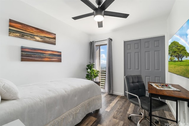 bedroom with ceiling fan, dark hardwood / wood-style flooring, and a closet