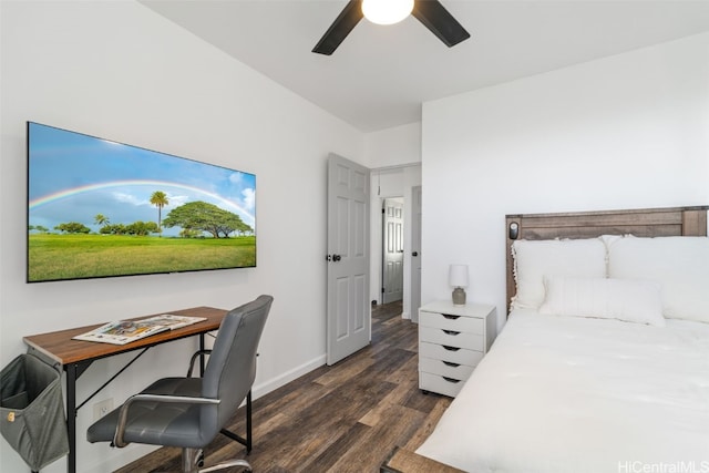 bedroom with ceiling fan and dark hardwood / wood-style flooring